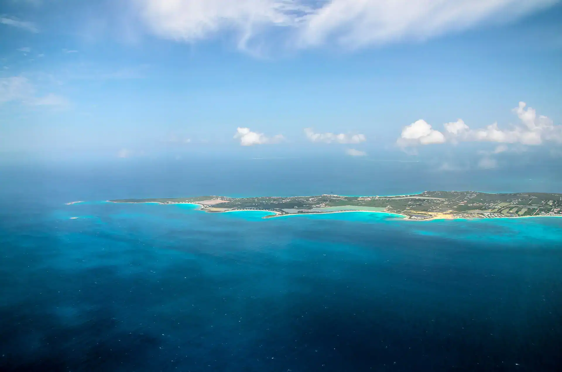 Aerial view of St. Maarten island with turquoise Caribbean waters